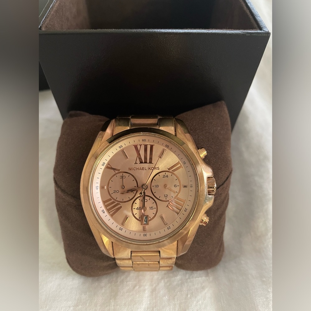 Michael  Kors watch. rose gold. worn a few times. Excellent condition